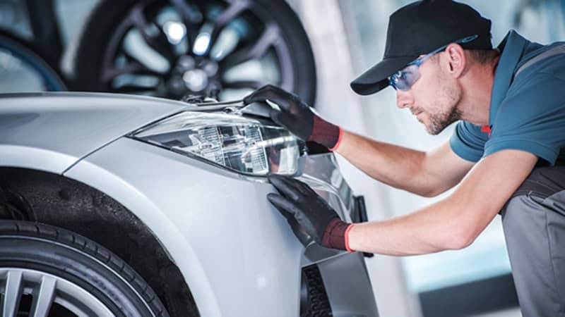 Headlights being installed
