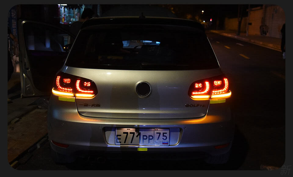 A brown car with VW Golf 6 MK6 Tail Lights 2009-2012 R20 was driving safely in the dark