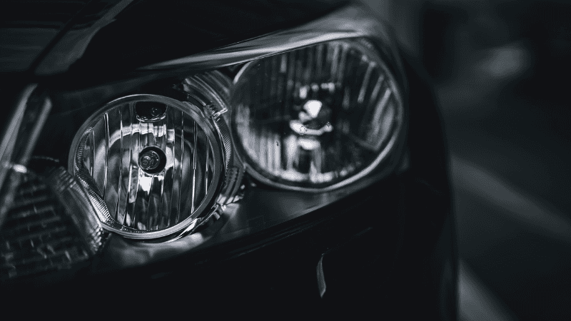 close-up of a car's dipped headlights