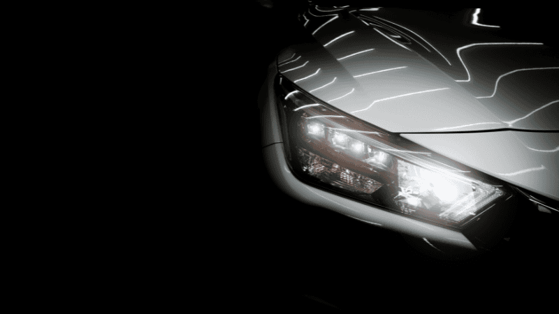 a car with a headlight beam pattern