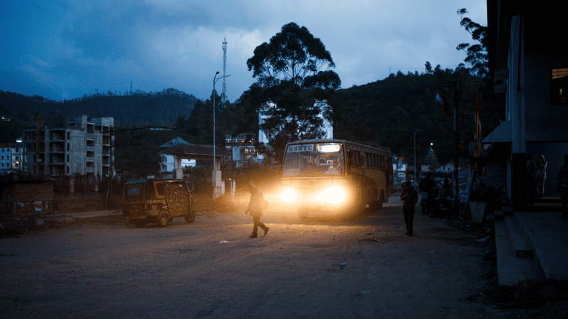 A minibus turned on its high beams at a passerby.