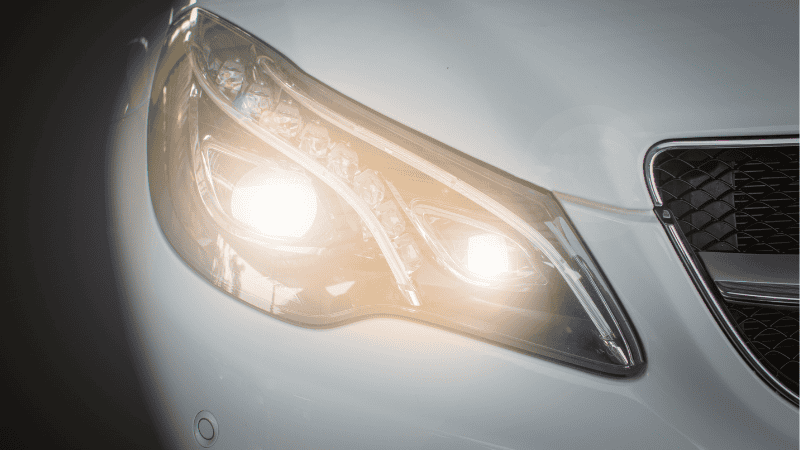 Illuminated LED headlights of a car. 