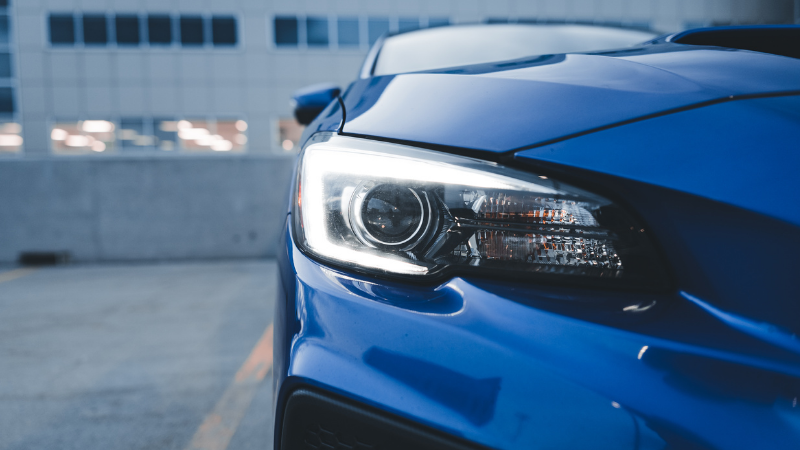 Close-up of a H1 headlight in a sleek car