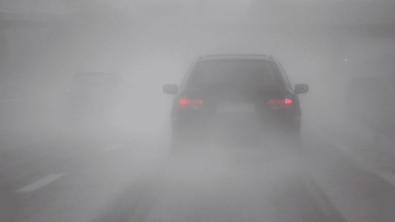 Driving on a foggy road