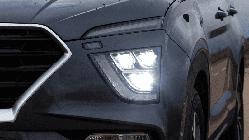 LED Headlights on this black car.